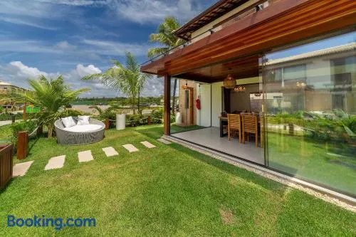 Lindo e elegante bangalô em Imbassaí Privilege - Casa I04 - Image 1