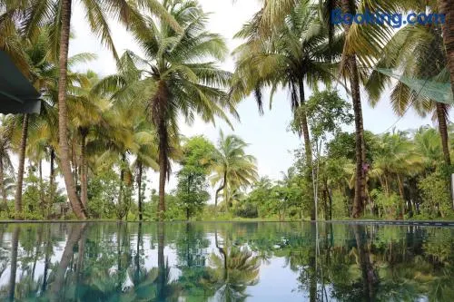 Priti Garden Farmstay, Kelwa Palghar -4 BR farmhouse with pool, pond, games,bbq - Image 1