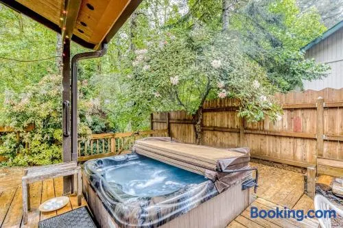 Expansive Wooded Home with a Brook Firepit Private Hot Tub and Shared Pool - Image 1