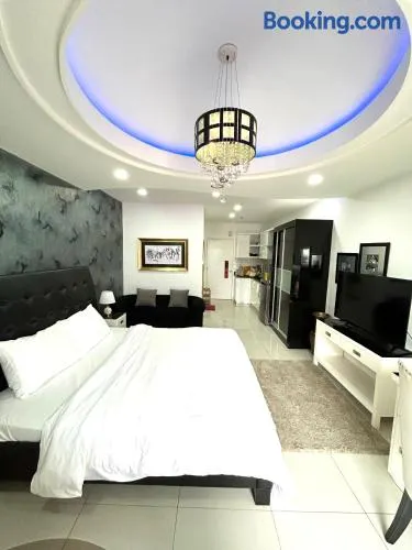 Deluxe room with king bed and Balcony at Kandi Palace - Image 1