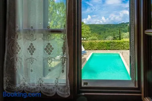 Experience the charm of Tenuta Le Caselle a cozy farmhouse surrounded by nature and comfort - Image 1