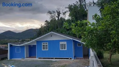 Suítes Simples Casa Madeira - Blumenau - Image 1