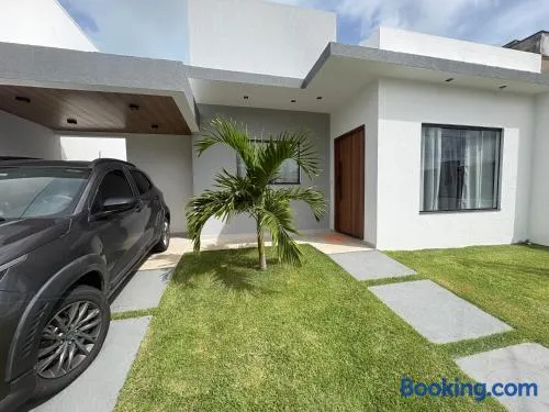 Casa de praia em condomínio - Image 1