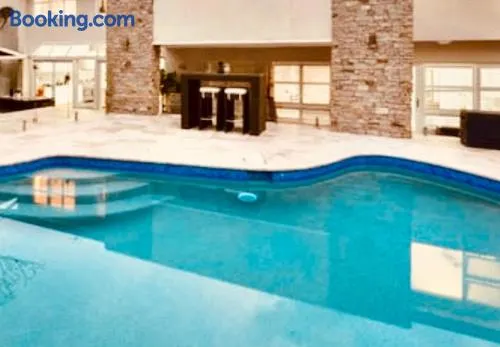 Spacious Luxury Home w Pool Sportscourt Forest Water City Views - Image 1