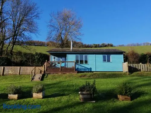 Badgers Den, a beautiful log cabin in a secluded valley close to the beach - Image 1