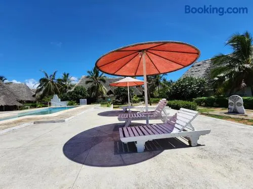 Karibuni, Villa 107, Beachfront Stay with Restaurant, Pool & Bar - Image 1