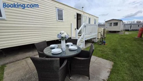 3BR Family Caravan Steps Away From Beach With Free WiFI, Smart TV & Fishing Lake, Arcades - Image 1