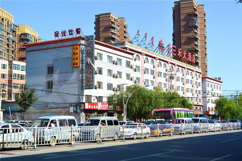 Xin Sanhe Hotel - Image 1