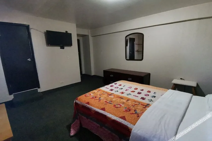 Capital O Baja Place Inn - Image 1