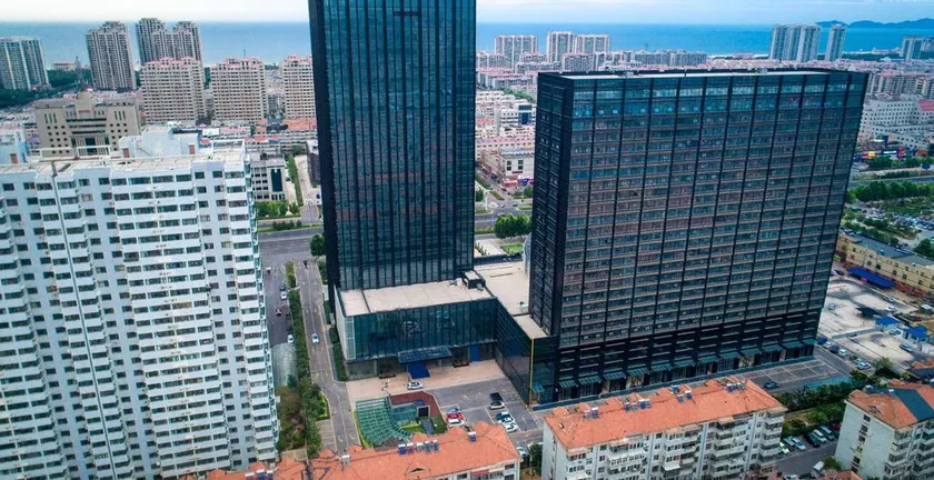 Sanhexing Inn (Yantai Development Zone) - Image 1