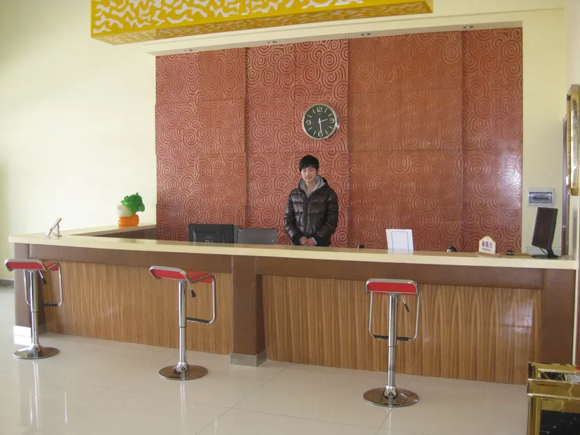 Baiyulan Business Hotel （Weihai Torch Eight Street, Shandong University） - Image 1