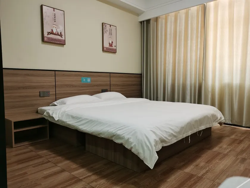 Qufu Xueerxing Hotel (East Railway Station Yuandong College) - Image 1