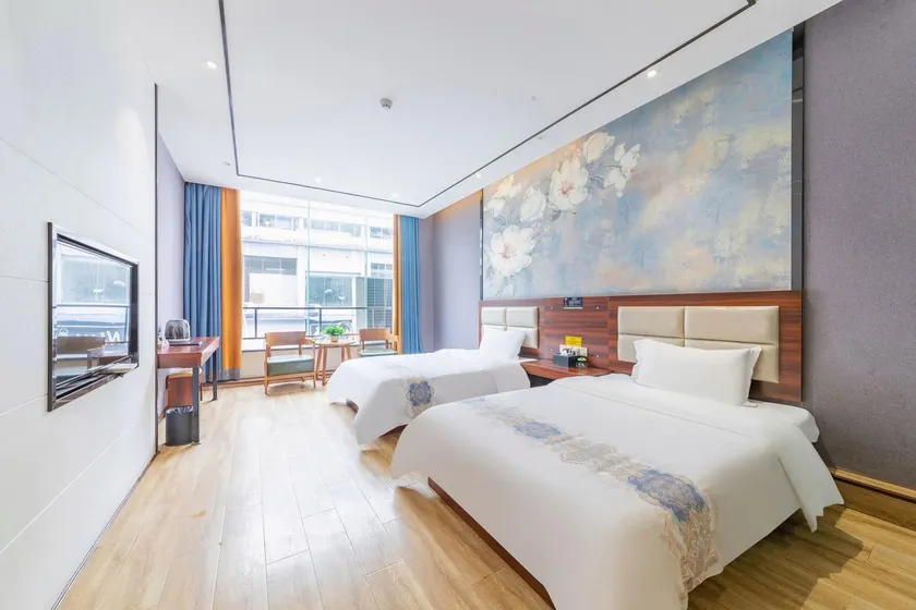Xinfeng Mango Holiday Hotel - Image 1