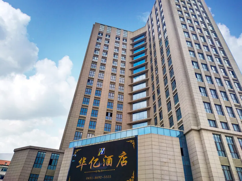 Huayi Hotel - Image 1