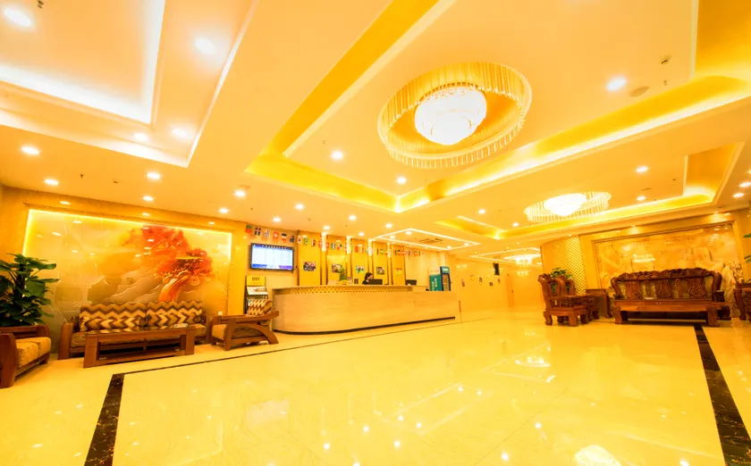 Huamei Business Hotel - Image 1