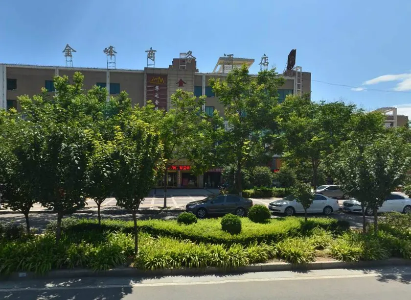Huashan Jin Feng Business Hotel - Image 1