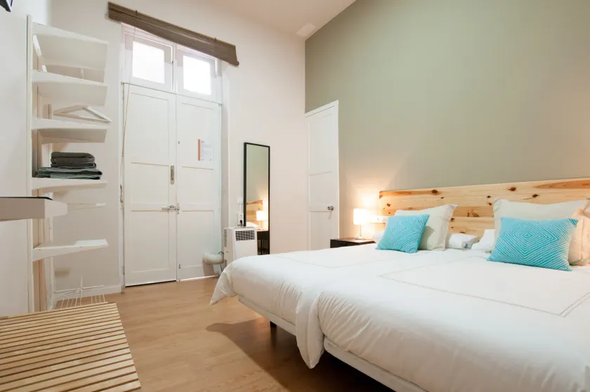 Triana 103 Rooms & Suites - Image 1