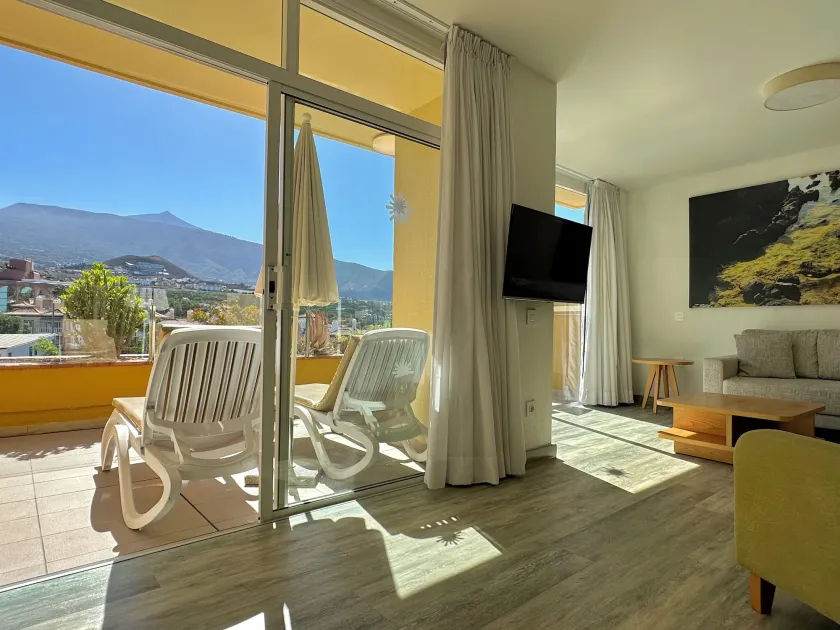 Apartamentos Tigaiga Suites - Wohnbereich