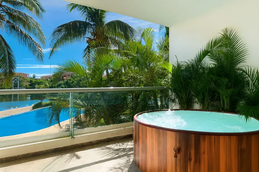 High-End Waterfront Condo at Secrets Waters - Image 1