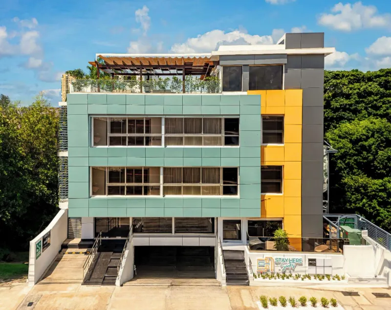 Hotel Stay Here Suites - Image 1