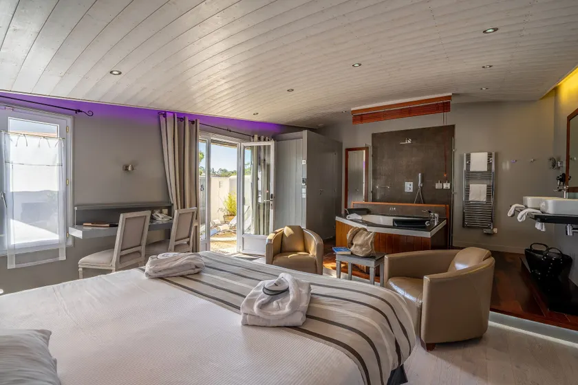 Elégance Suites Hôtel - Image 1