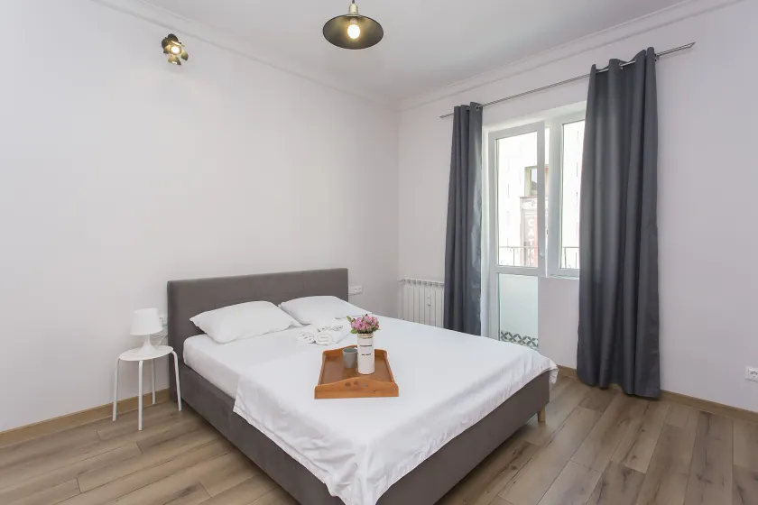 Sunny and Modern 1BDR Apartment in the Center - Image 1