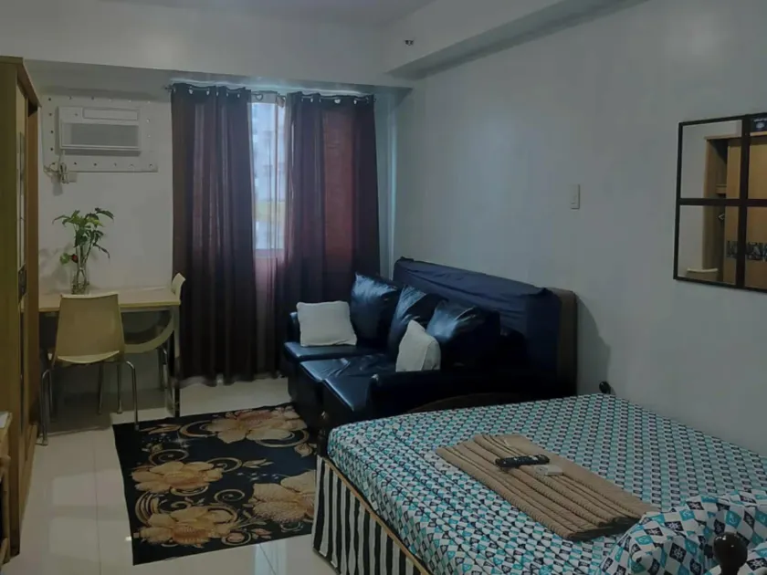 Modern Condo in Quezon City with Private Pool and City Views - Image 1