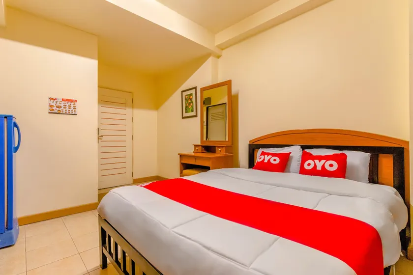 OYO 583 Sweethome Guest House - Image 1