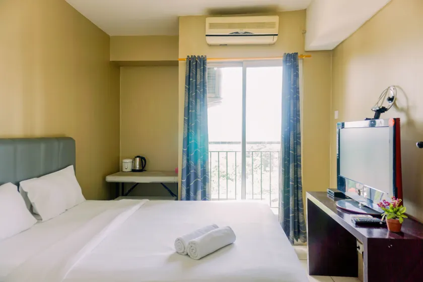 Comfortable And Modern Studio Serpong Greenview Apartment - Habitación