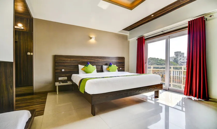 Treebo Shree Sai Suites - 2km from Mahalaxmi Temple - Image 1