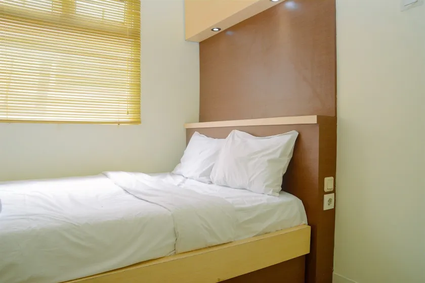 Fully Furnished and Cozy 2BR at Green Pramuka City Apartment - Image 1