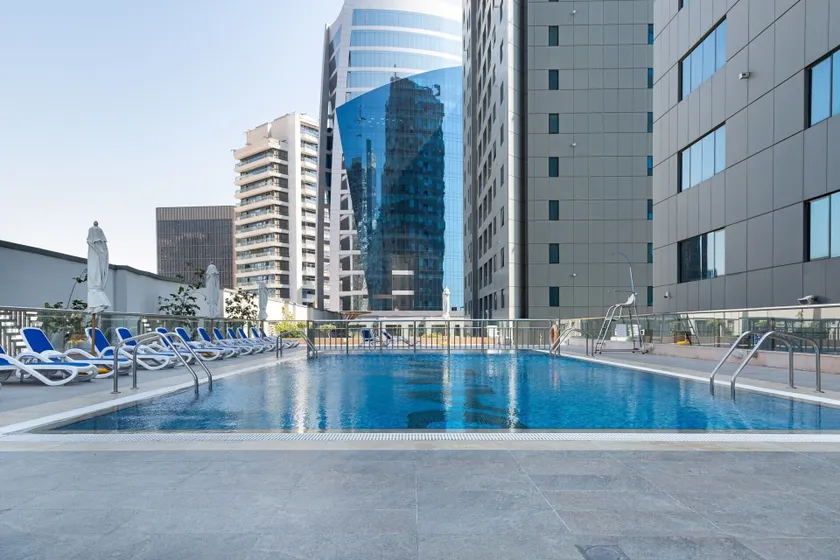 Stylish & Space-savvy 1BR Apt in Business Bay - Image 1