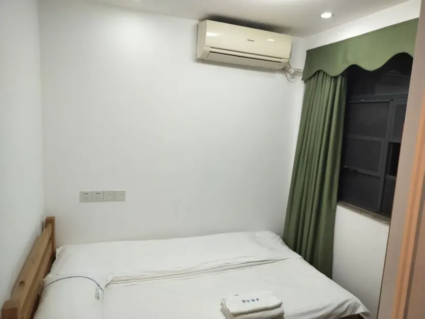 Li He Yu Jia Apartment Hotel - Habitación