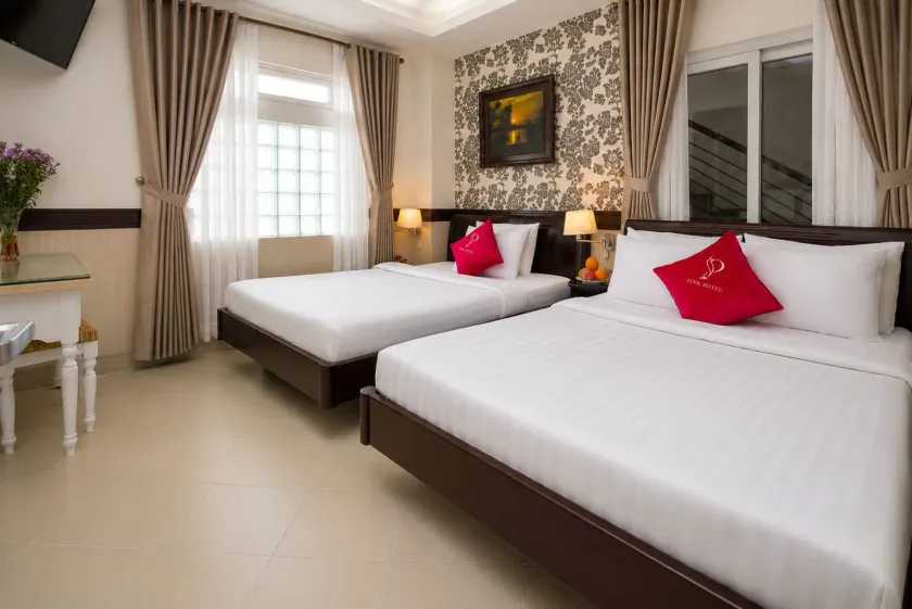 Pink Suite Saigon Airport Hotel - Image 1