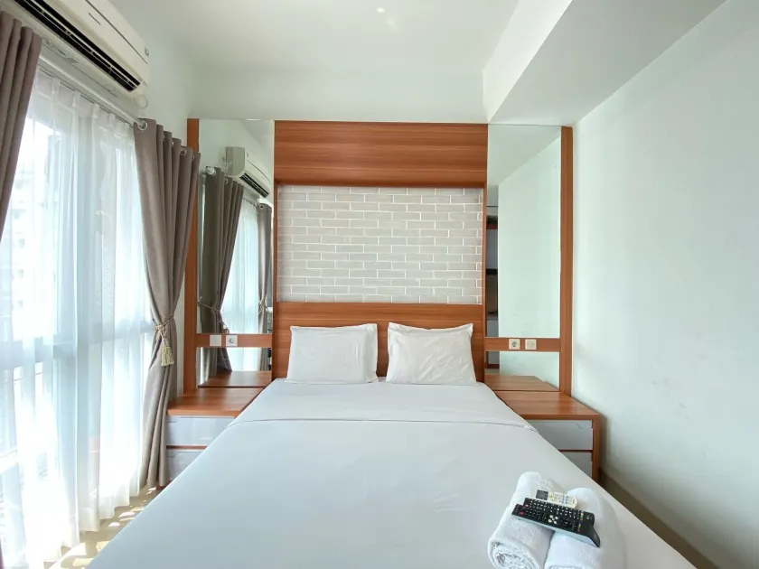 Monochrome Studio Room At Taman Melati Jatinangor Apartment - Image 1