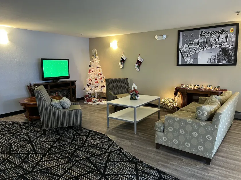Super 8 by Wyndham Escanaba - Coin salon dans le hall