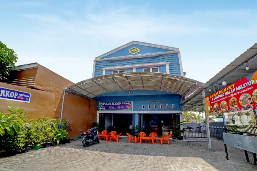 Hotel O Gurusinga Guesthouse - Image 1