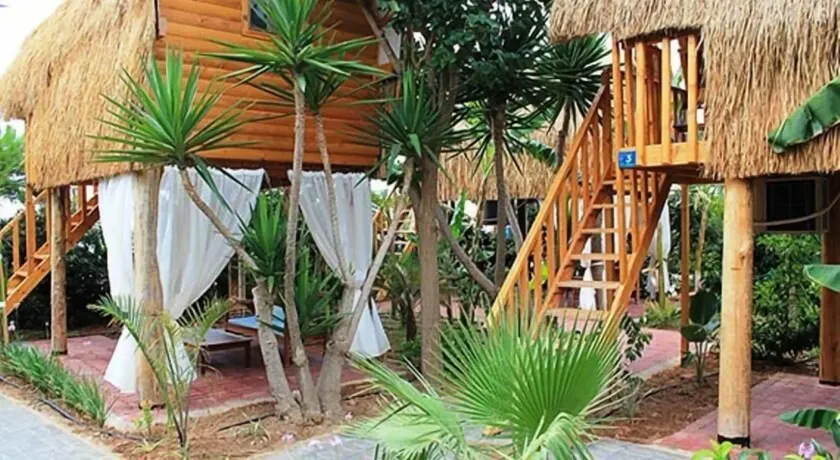 Triton Hotel & Bungalows - Image 1