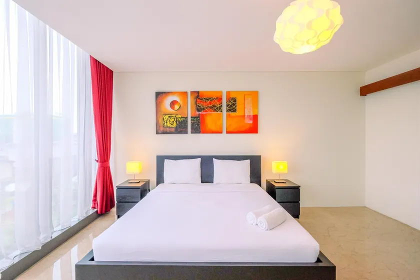 Good Deal and Strategic 1BR L'Avenue Apartment By Travelio - Image 1