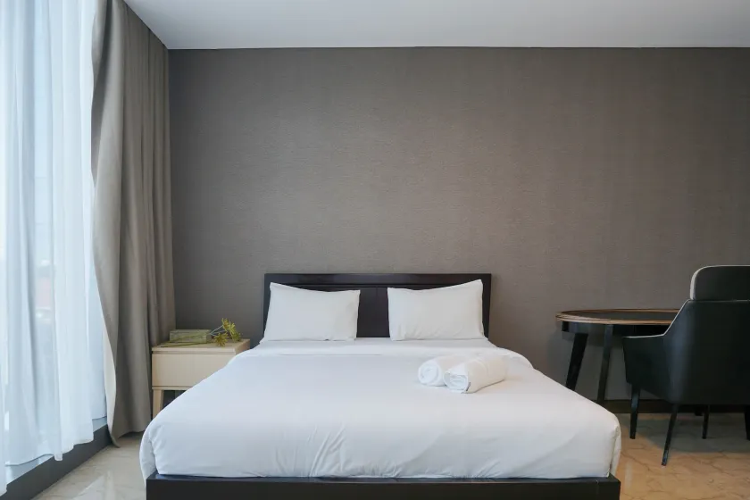 Luxurious 1BR at L'Avenue Apartment near Sampoerna Universitas By Travelio - Image 1