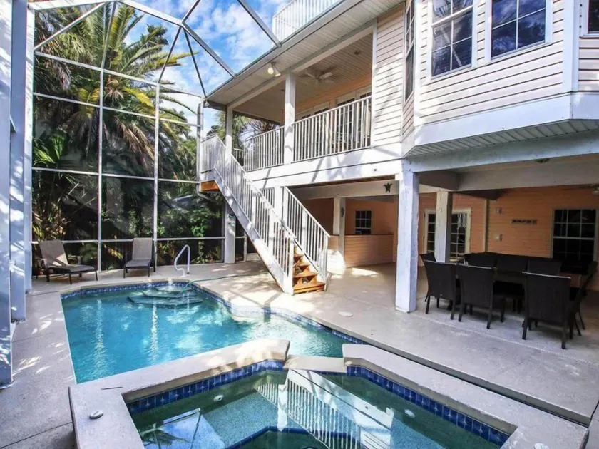 Maison de piscine magnifiquement rénovée dans le quartier du village de Captiva - Image 1