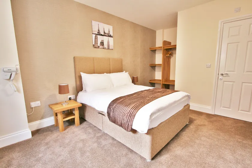 New County Hotel & Serviced Apartments by RoomsBooked - Image 1