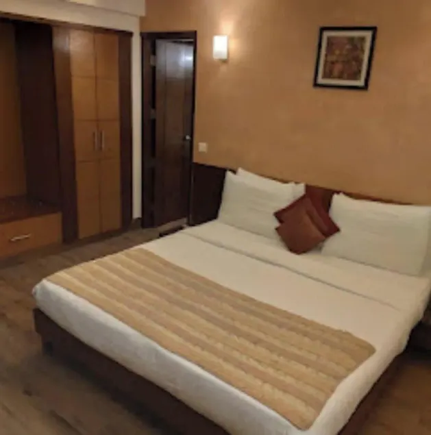 Green Lotus La Wisteria Inn - Chambre