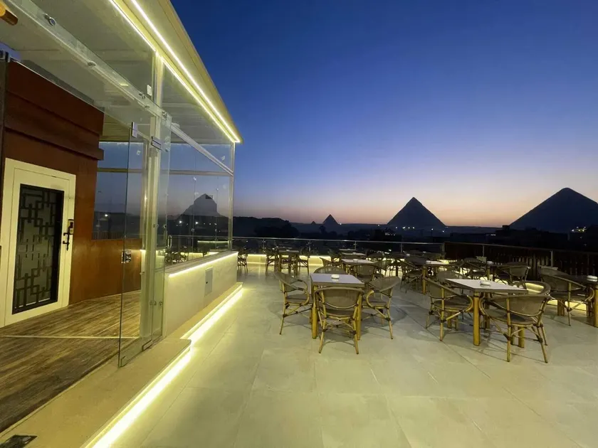 AKHNATON Pyramids View Hotel With Rooftop Access & free airport pickup - Image 1