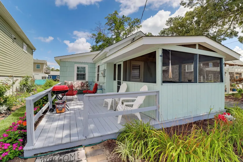 Deck & Indian River Bay Views: Coastal Cottage - Image 1