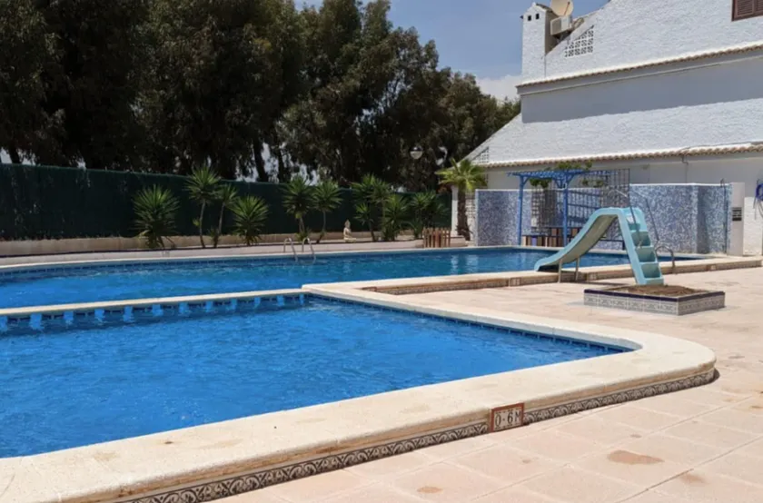 Charming 3-bedroom House With Shared Pool in Punta Prima, Torrevieja - Image 1