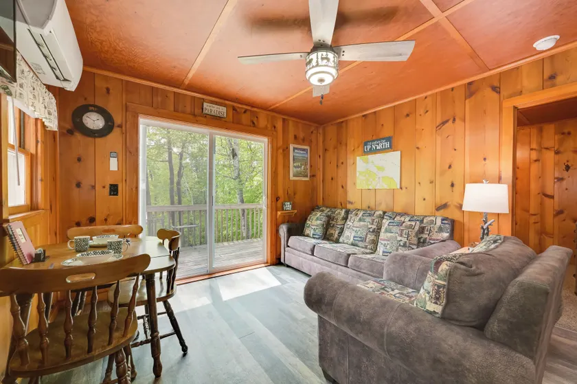 Near Snowmobiling! Carp Lake Cottage w/ Fire Pit - Image 1
