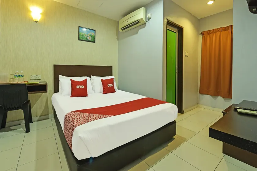 Hotel O M Three Hotel - Image 1