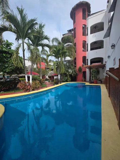Hotel y Suites Los Encantos - Image 1
