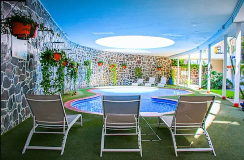 Country Hotel & Suites - Image 1